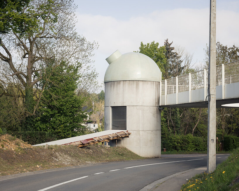 label crowns elevated walkway with telescope-like dome in belgian sports center renovation