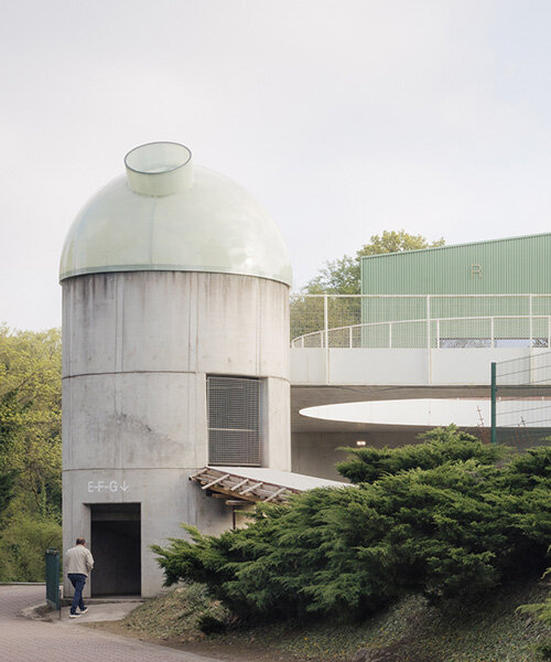 label crowns elevated walkway with telescope-like dome in belgian sports center renovation