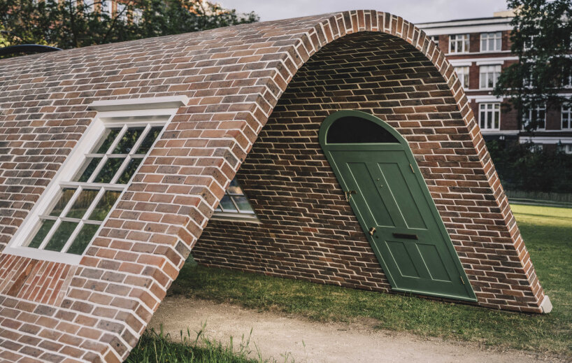 Alex chinkek monument brick mask sculpture