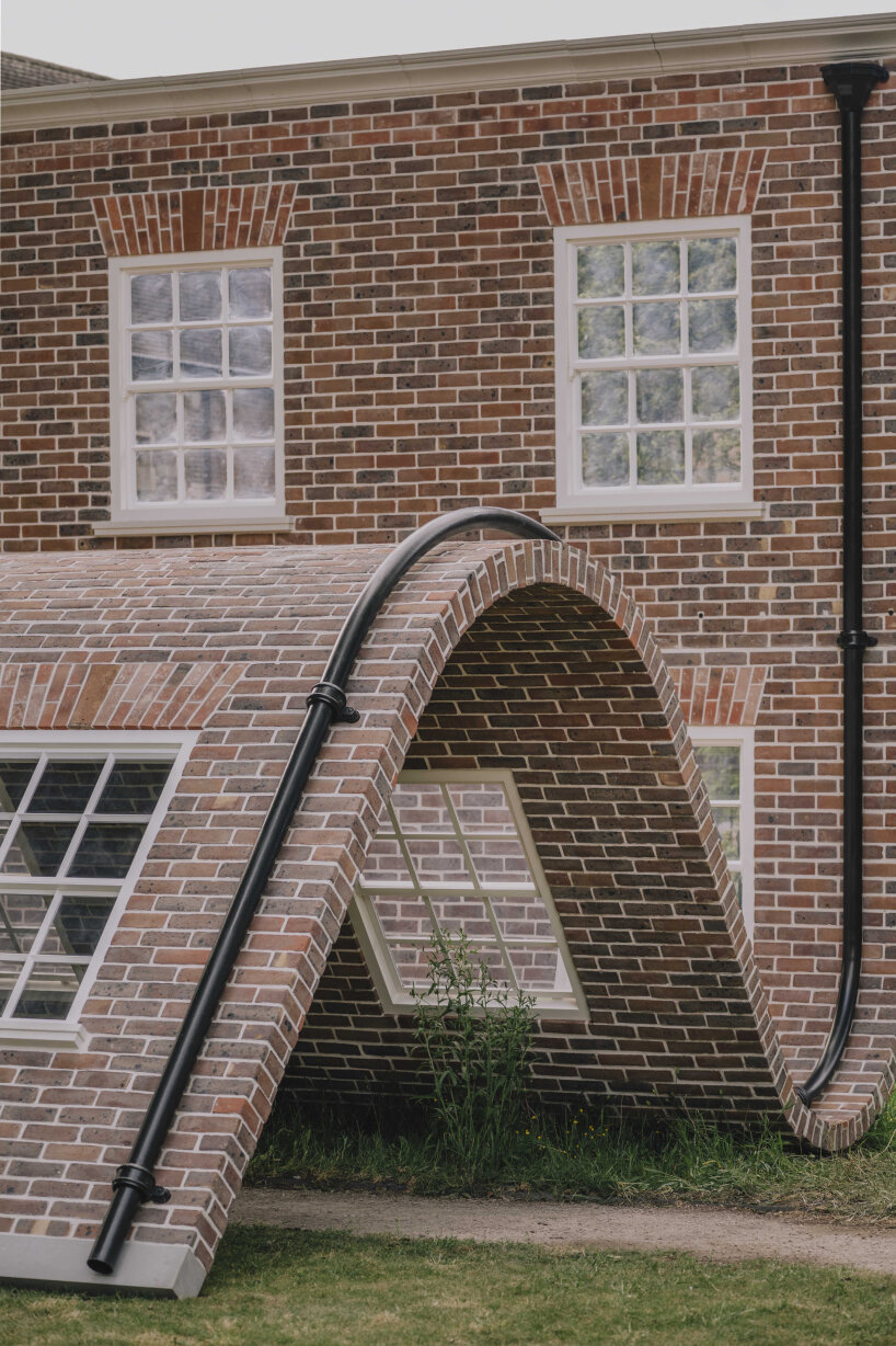 Alex chinkek monument brick mask sculpture