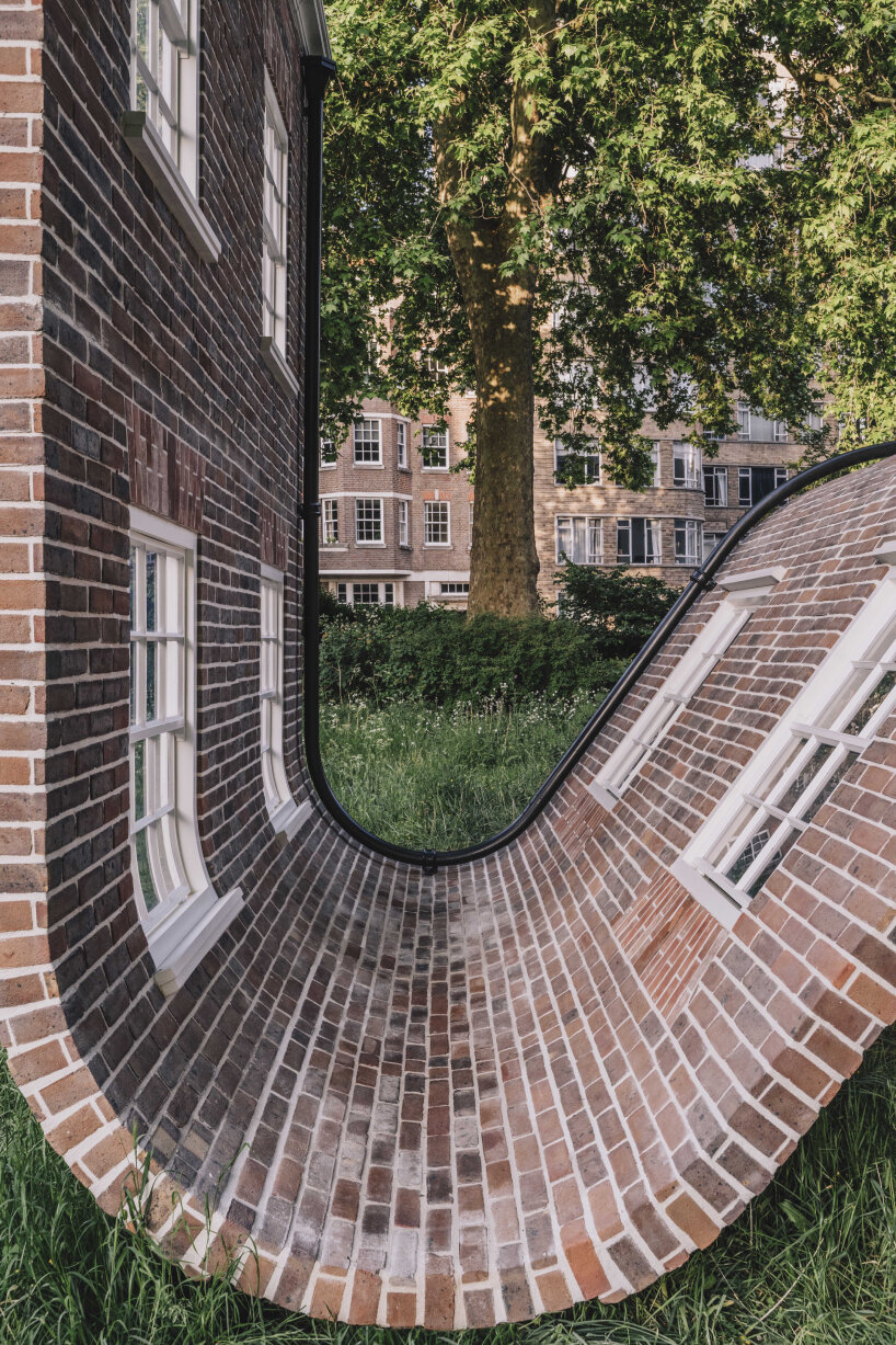 Alex chinkek monument brick mask sculpture