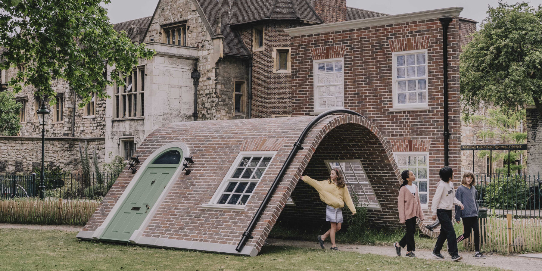 london-alex-chinneck-bricks-facade-sculpture-public-art-clerkenwell-design-week-designboom-ban