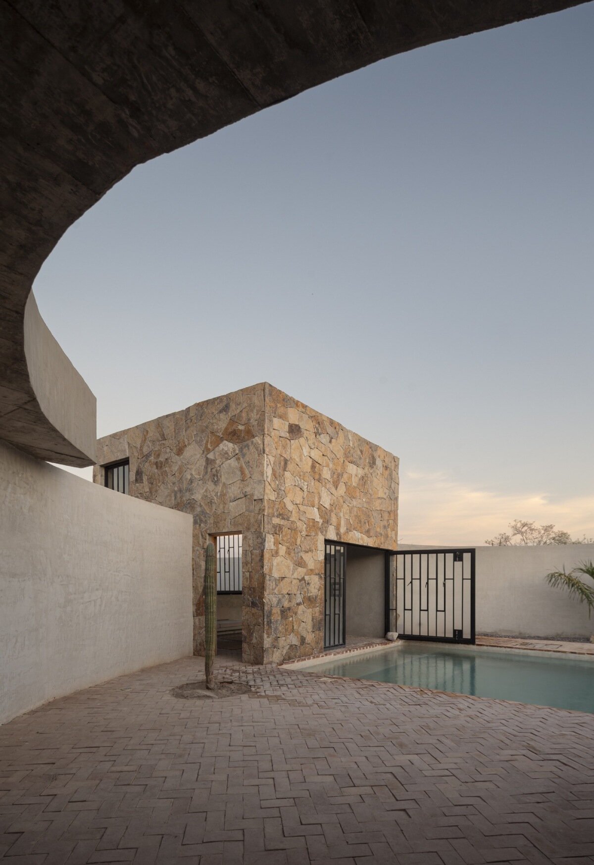 ludwig godefroy's cluster of volumes at casa la paz shape 'a garden with a house' in mexico