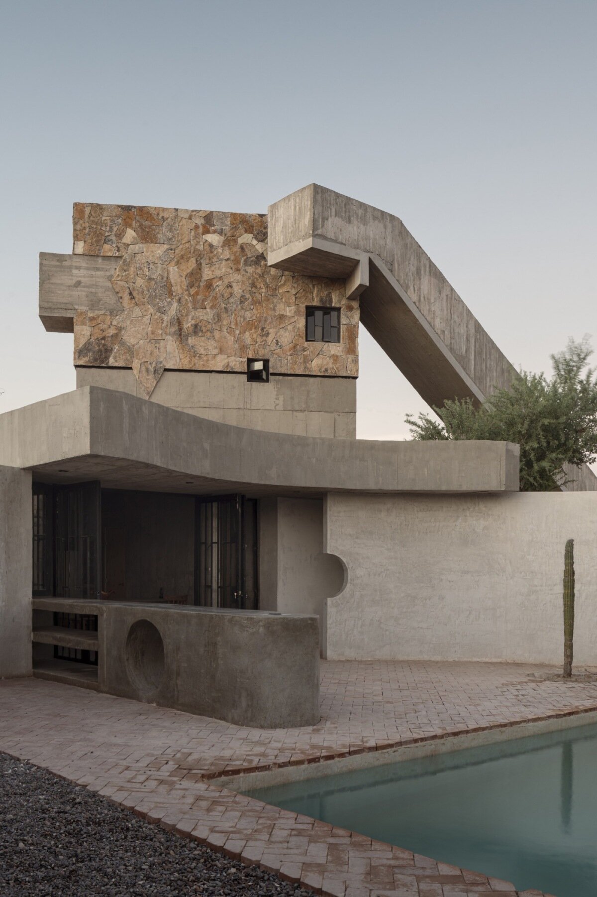 ludwig godefroy's cluster of volumes at casa la paz shape 'a garden with a house' in mexico