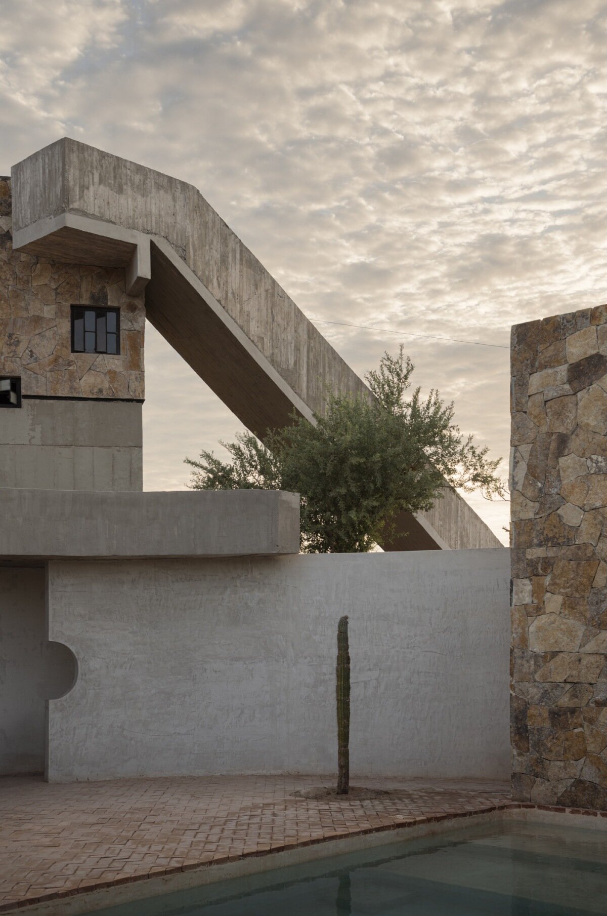 ludwig godefroy's cluster of volumes at casa la paz shape 'a garden with a house' in mexico