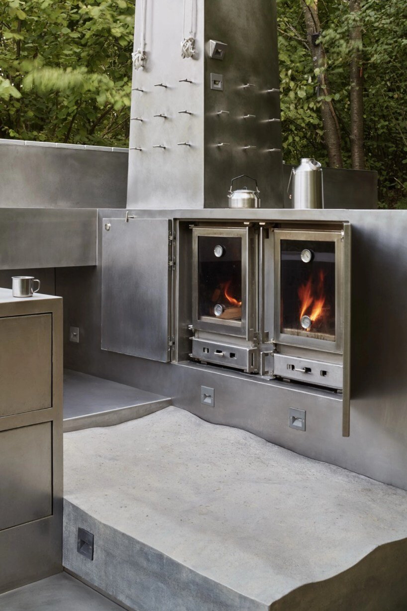 carrocerra collective's open-air steel house in italian forest reimagines ritualistic living