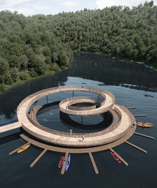 X atelier's wooden mobius pier rises in a loop from a riverbank in portugal