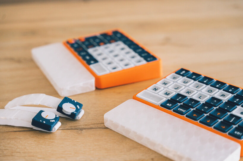 the designer applies an orange color for modular keyboards and a watch-like look for the wearable cuffs