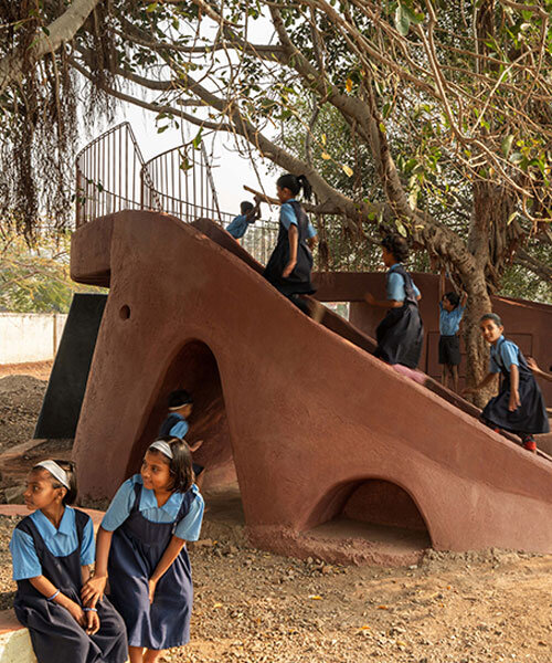 pod for happiness sculpts curving play area around banyan tree in indian school campus