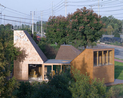 three sloping geometries shape MAT office's pyramid book house in rural china