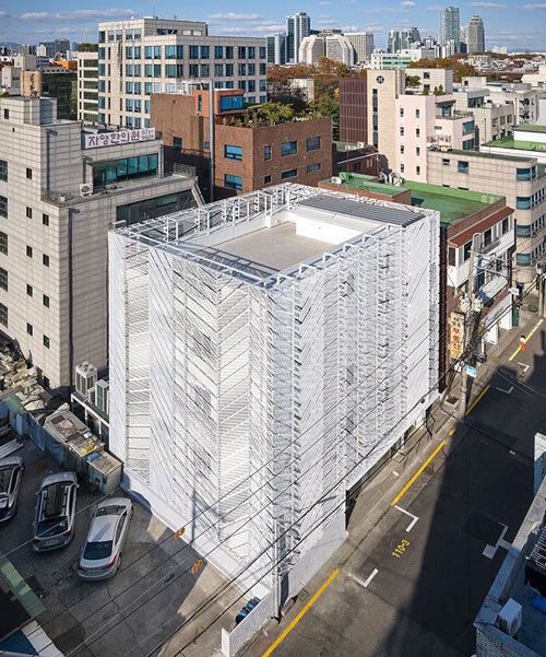 perforated metal panels reframe building's exterior into responsive facade system in seoul