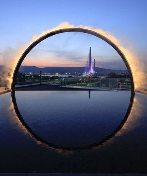 ring of mist and light frames illuminating oculus installation by studio JT in seoul