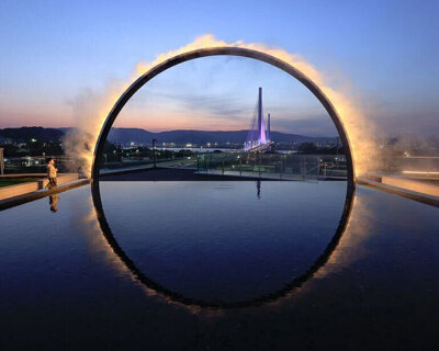 ring of mist and light frames illuminating oculus installation by studio JT in seoul