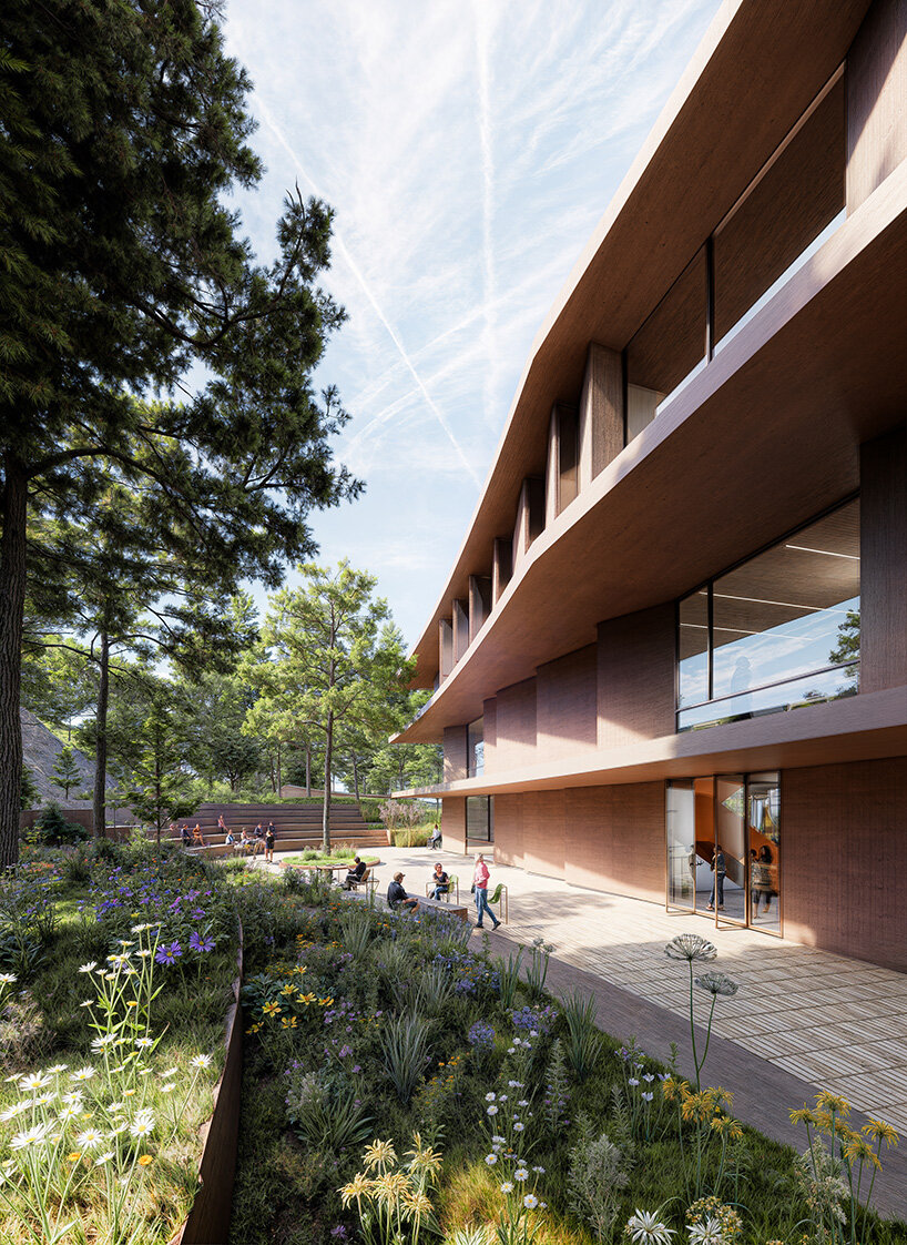 rotating facade panels shield PILA's building for anatolia college in thessaloniki, greece