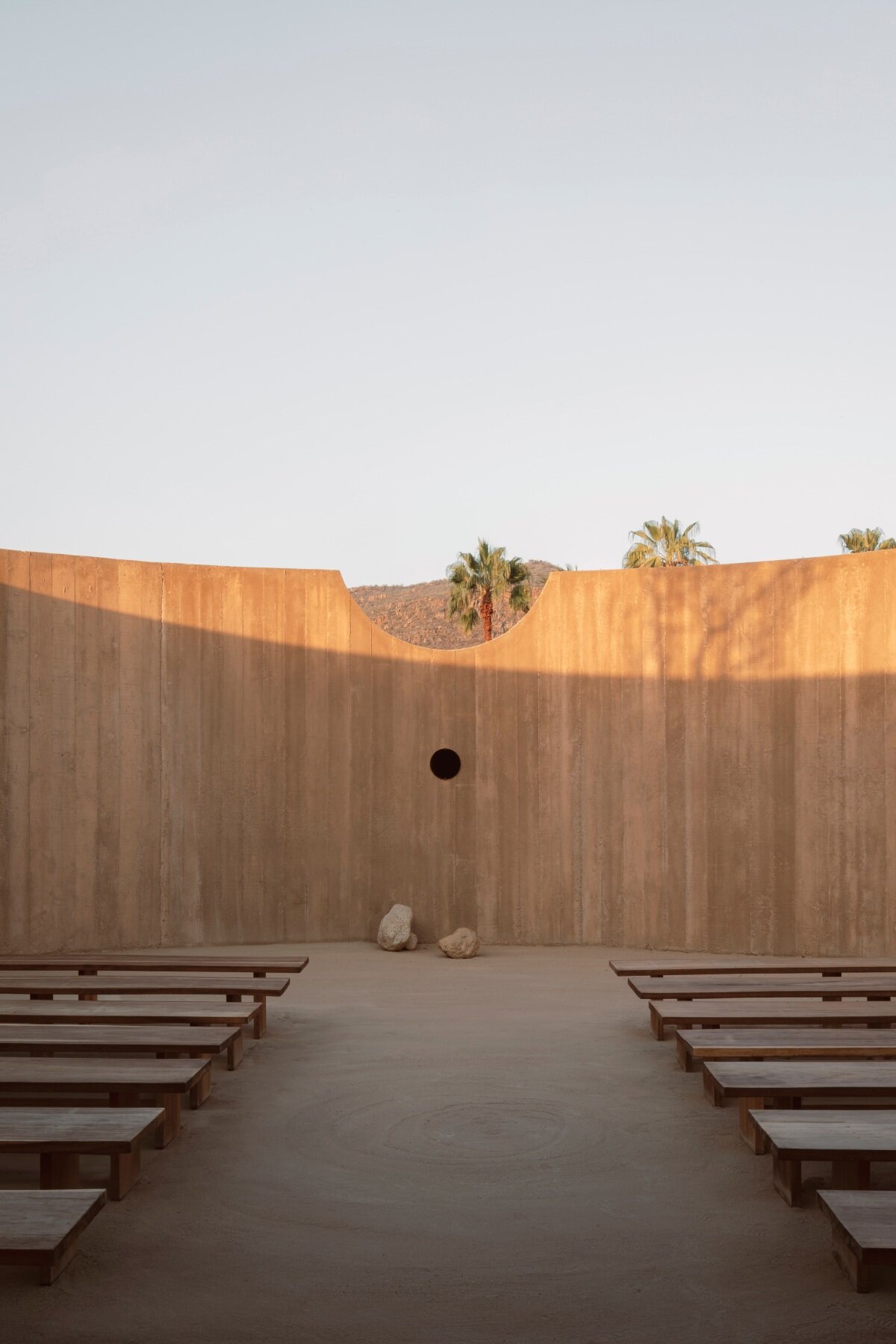 The concrete ring wraps around the spiritual enclosure of the practice Rubén Valdez in the Mexico Desert
