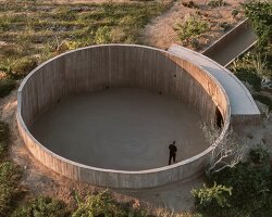 concrete ring wraps around rubén valdez practice's spiritual enclosure in mexico desert