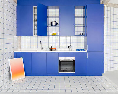 blue and white interiors link renovated 1930s apartment to its seaside setting in spain