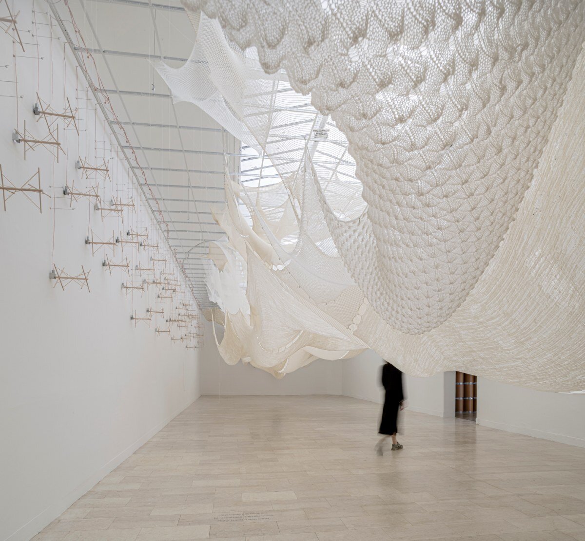 The ephemeral woolen covers drain over the Serbian pavilion at the Venice Architecture Biennale