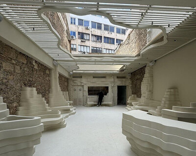 snarkitecture sculpts creamy contours into canyon-like athens burger spot
