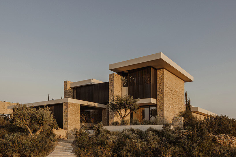 k-studio's 'southwand house' follows the sloping olive groves of costa navarino in greece