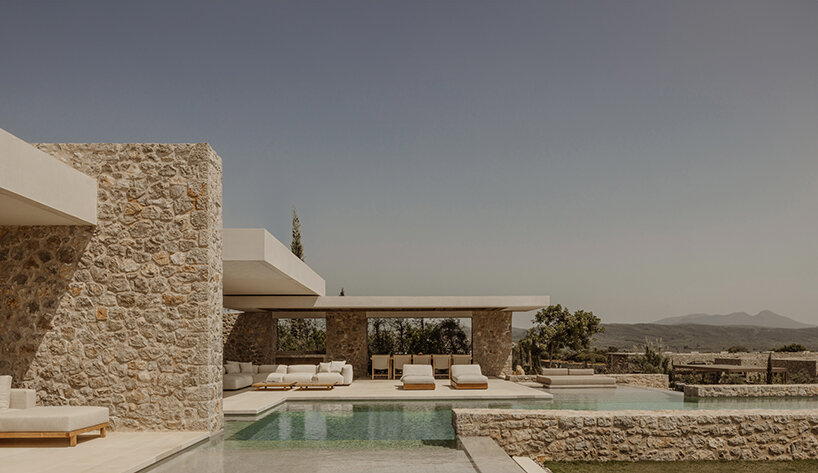k-studio's 'southwand house' follows the sloping olive groves of costa navarino in greece