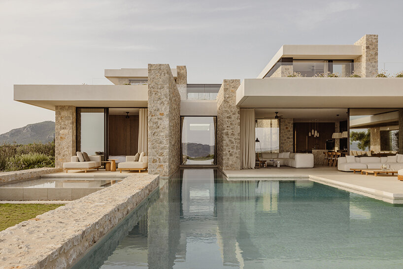 k-studio's 'southwand house' follows the sloping olive groves of costa navarino in greece