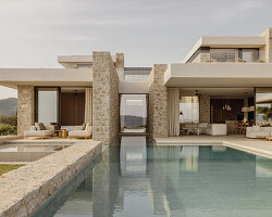 k-studio's 'southwand house' follows the sloping olive groves of costa navarino in greece