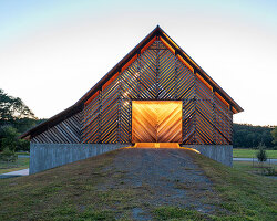 sylvia richard-designed lyme barn glows like a patterned lantern in new england