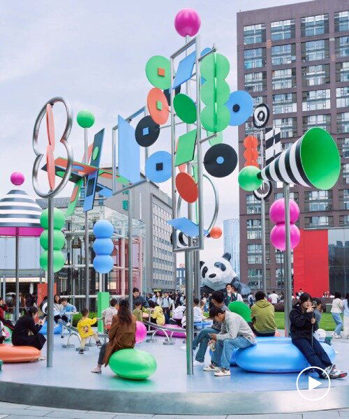 wade and leta's colorful constellation of shapes and patterns spins on rooftop in china
