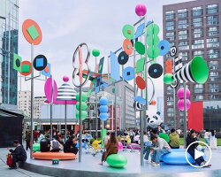 wade and leta's colorful constellation of shapes and patterns spins on rooftop in china