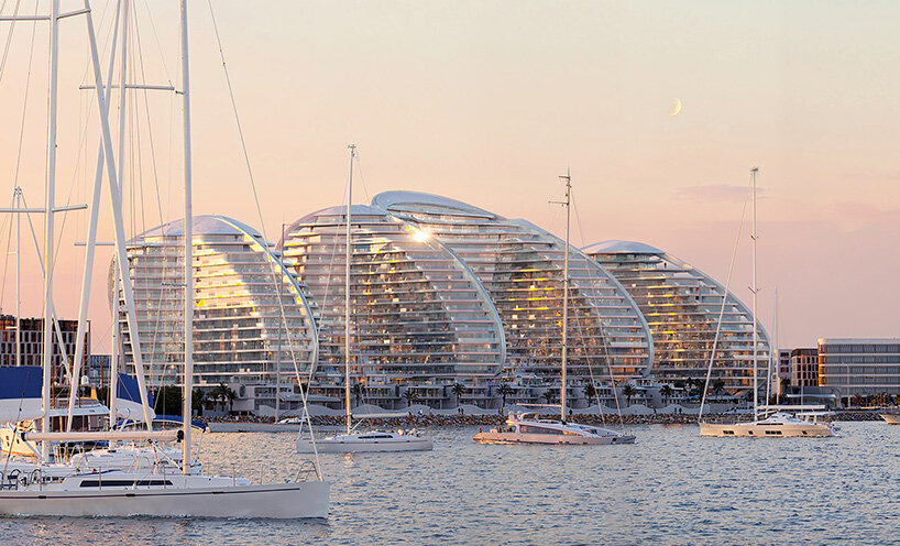 zaha hadid architects sculpts rippling seafront towers for al marjan island in UAE