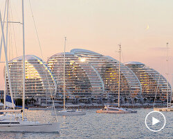zaha hadid architects sculpts rippling seafront towers for al marjan island in UAE
