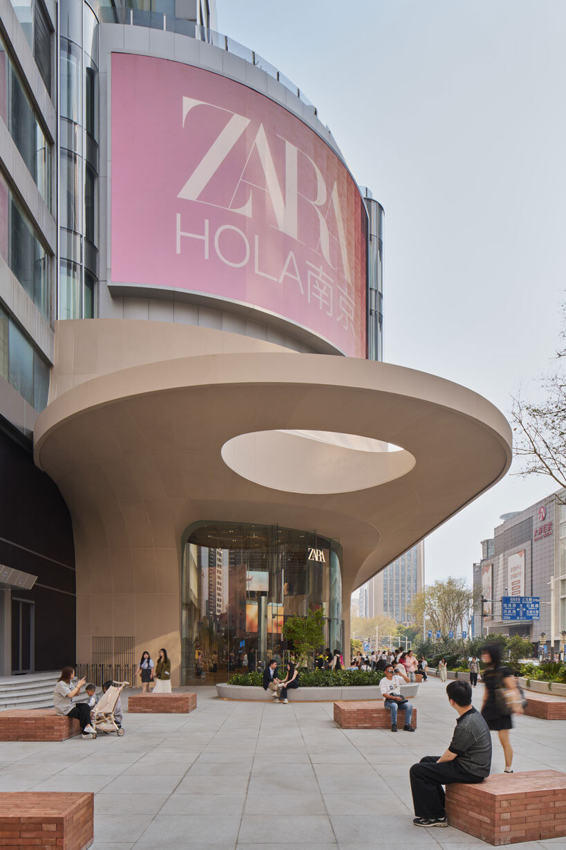 AIM architecture's flowing curved facade shapes ZARA flagship store in nanjing