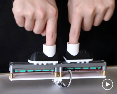 virtual football game fooscade comes with mini boots for your fingers