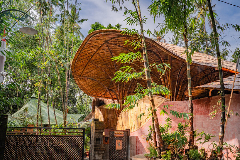 arched bamboo roof shades learning space in bali co-designed by students and mizzi studio