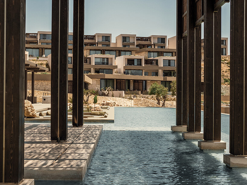 block722 sculpts JW marriott's crete resort into the landscape using stone from the site