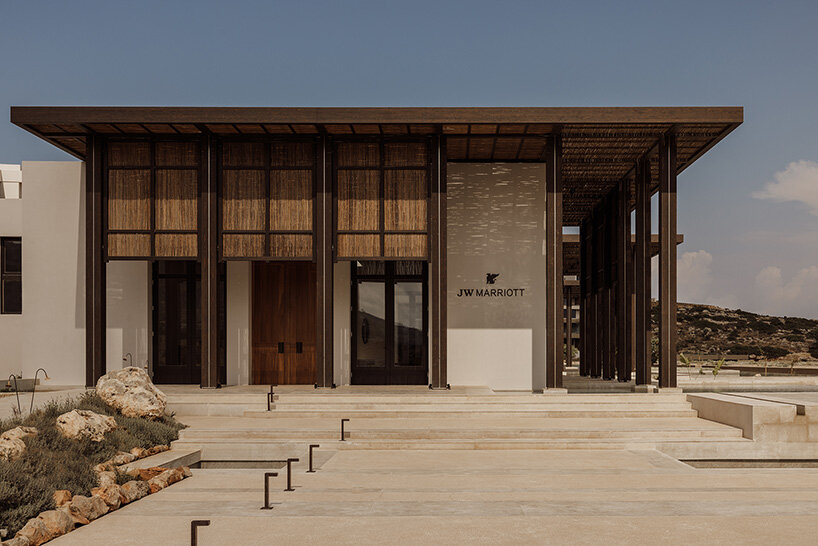 block722 sculpts JW marriott's crete resort into the landscape using stone from the site