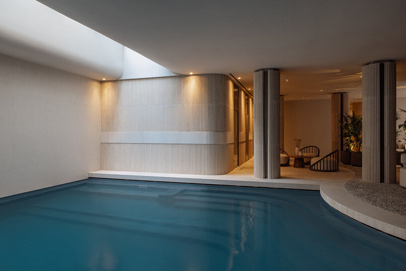 block722 sculpts JW marriott's crete resort into the landscape using stone from the site