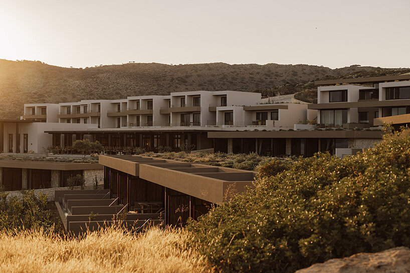 block722 sculpts JW marriott's crete resort into the landscape using stone from the site