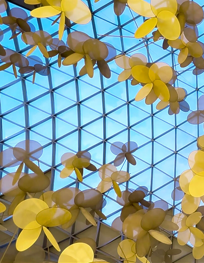 vincent leroy's kinetic installation of metallic flowers