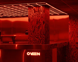 clap studio renovates valencia's oven club with red-hot interiors and kinetic light grids