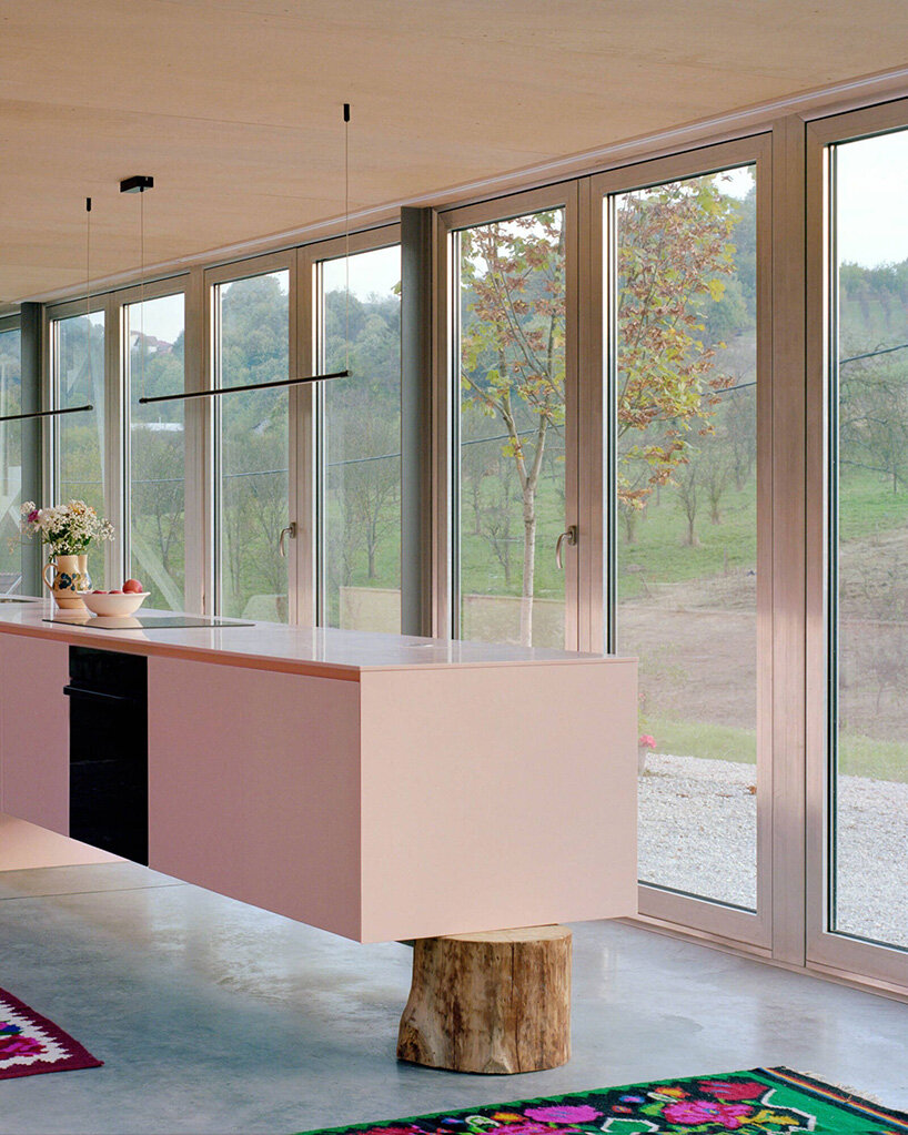 vivid rippled panels envelop TEN's care-based housing for women in bosnia-herzegovina