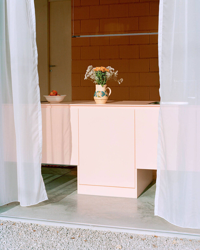 vivid rippled panels envelop TEN's care-based housing for women in bosnia-herzegovina