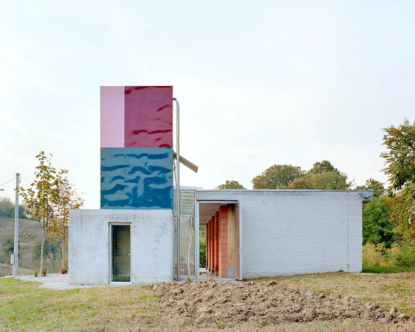 vivid rippled panels envelop TEN's care-based housing for women in bosnia-herzegovina