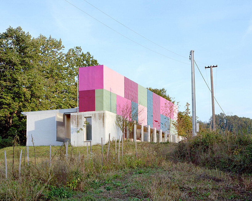 vivid rippled panels envelop TEN's care-based housing for women in bosnia-herzegovina