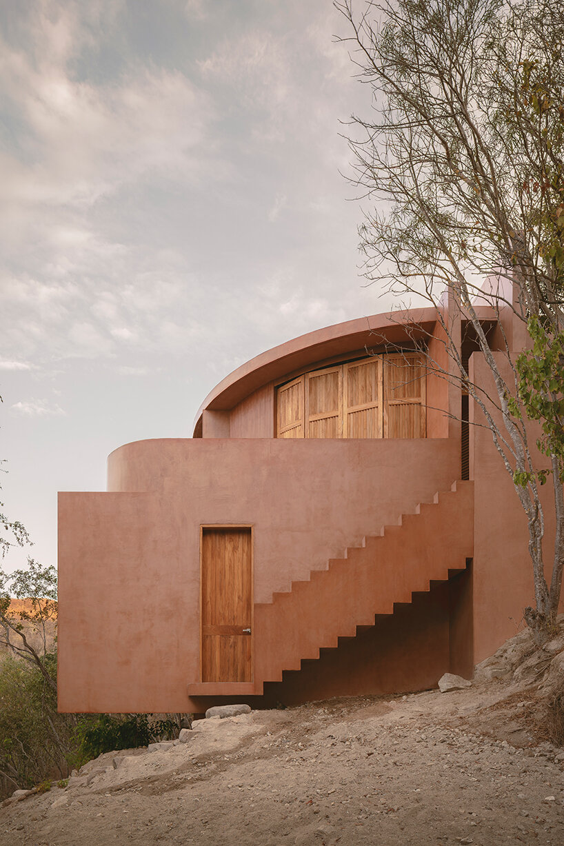 crab-shell dwelling by espacio 18 steps down the oaxacan cliffs in mexico