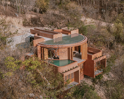 crab-shell dwelling by espacio 18 steps down the oaxacan cliffs in mexico