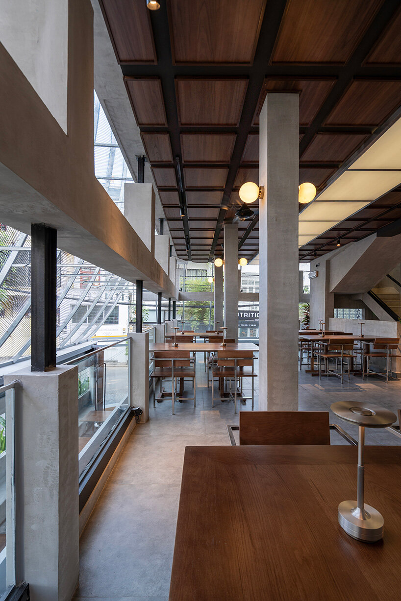 perforated metal veil by KHOA VU transforms old vietnamese villa into breathable restaurant