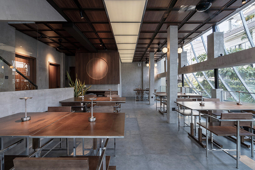 perforated metal veil by KHOA VU transforms old vietnamese villa into breathable restaurant