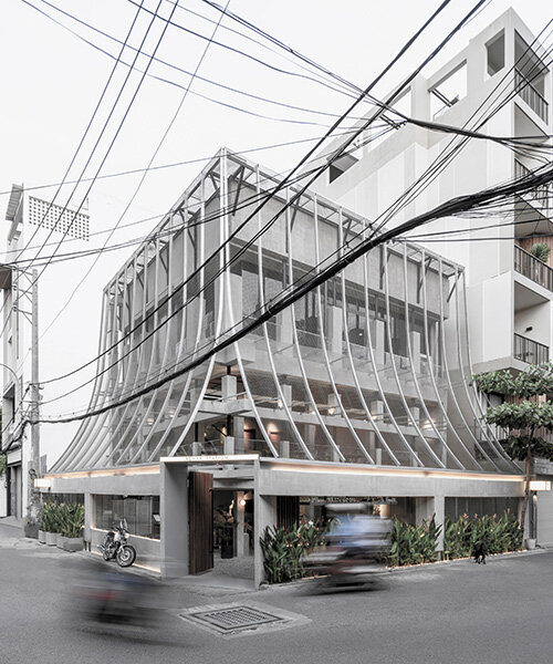 perforated metal veil by KHOA VU transforms old vietnamese villa into breathable restaurant